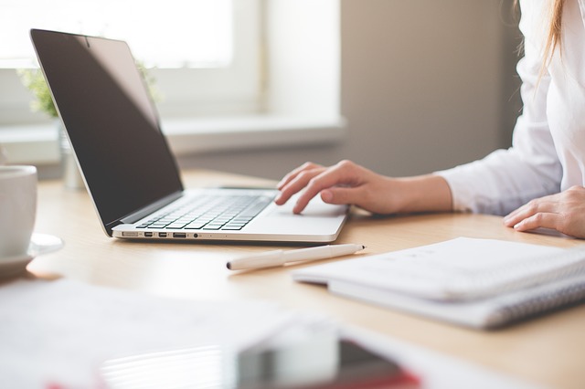 A Woman Researching on Closing Costs