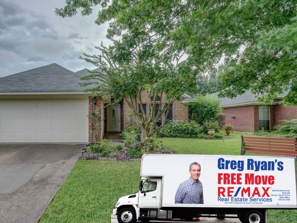 Greg Ryan moving truck in front of Bossier City Home